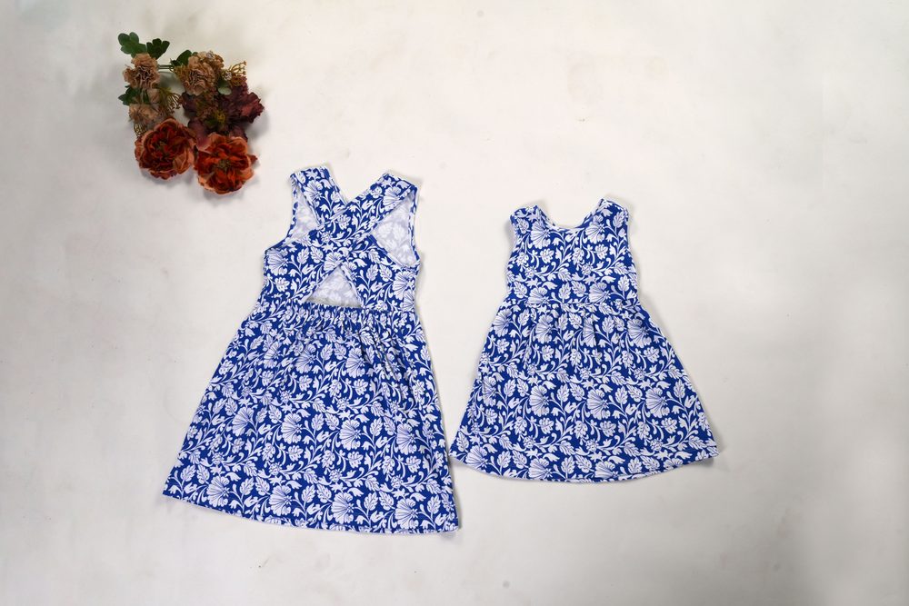 Blue ombré Diva Crossback dresses on hangers