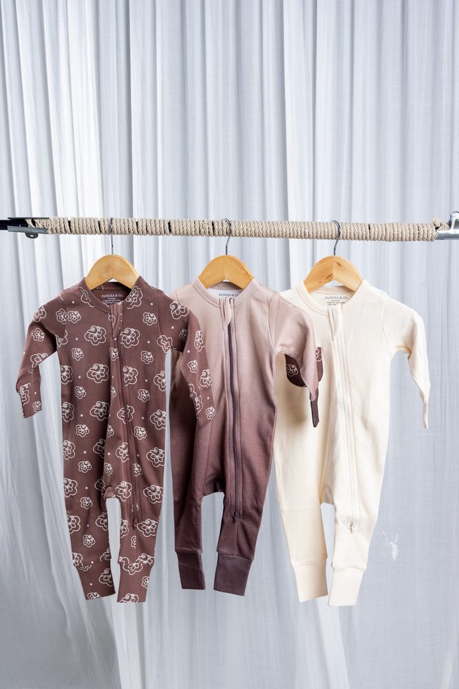 A rail of earthy-toned pieces from the Echoes of Kolam collection
